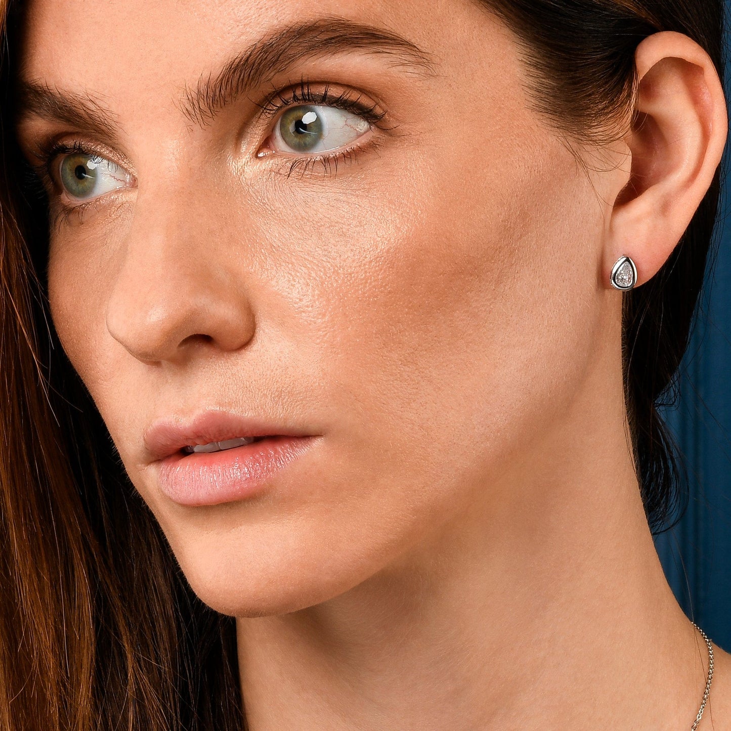 Dainty Silver Bezel Set Stud Earrings with Pear-Shaped Clear Cubic Zirconia Stones