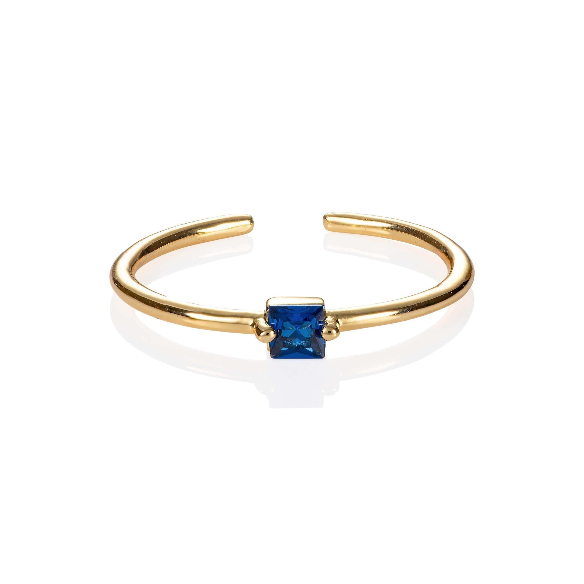 Adjustable Gold Plated Ring for Women with a Blue Cubic Zirconia Stone - namana.london