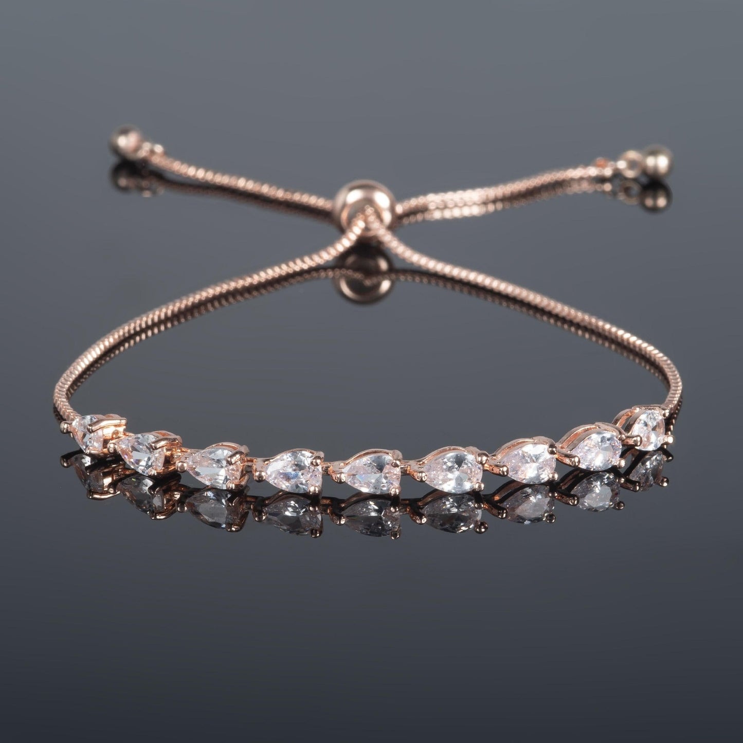 Adjustable Rose Gold Bracelet with Pear Shaped Cubic Zirconia - namana.london