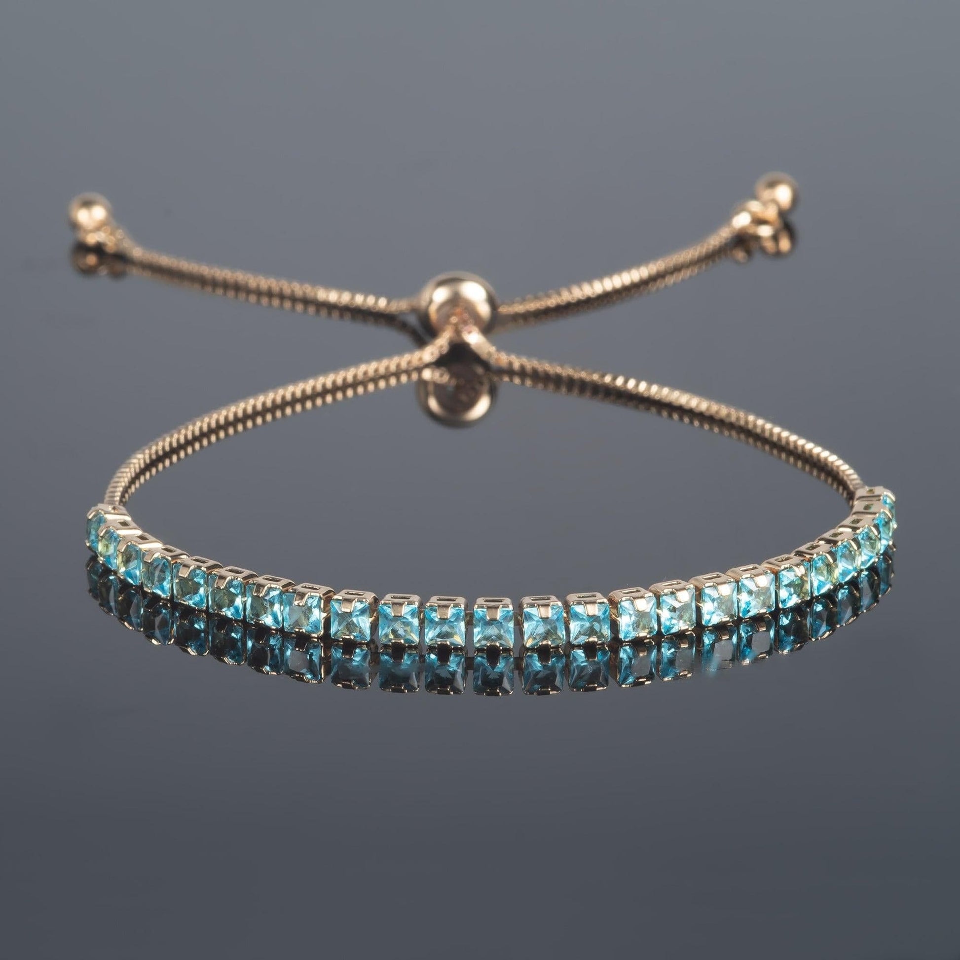 Adjustable Gold Bracelet for Women with Light Blue Stones - namana.london