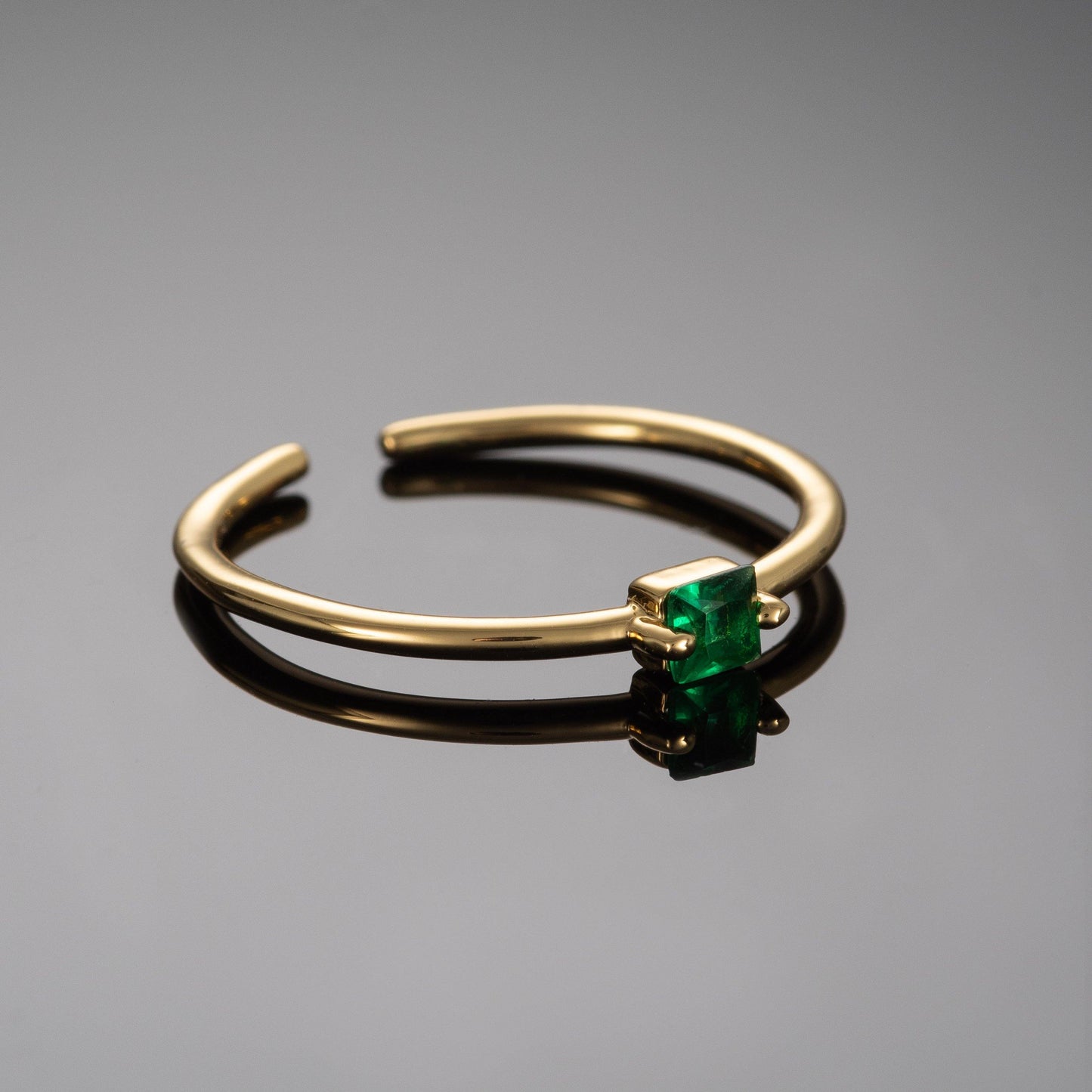 Adjustable Gold Plated Ring for Women with a Green Cubic Zirconia Stone - namana.london