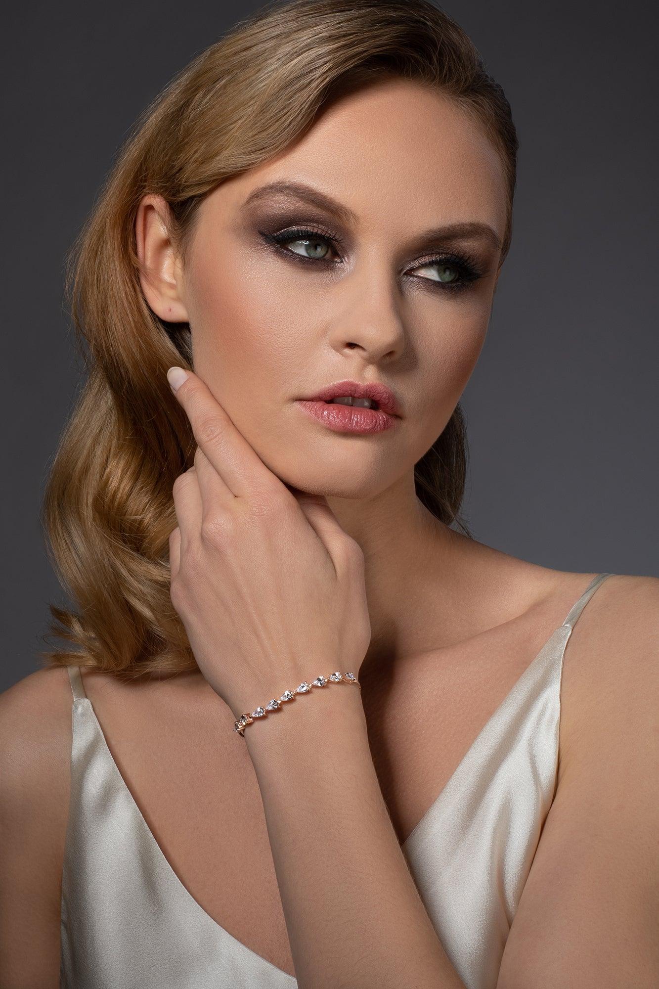Adjustable Rose Gold Bracelet with Pear Shaped Cubic Zirconia - namana.london
