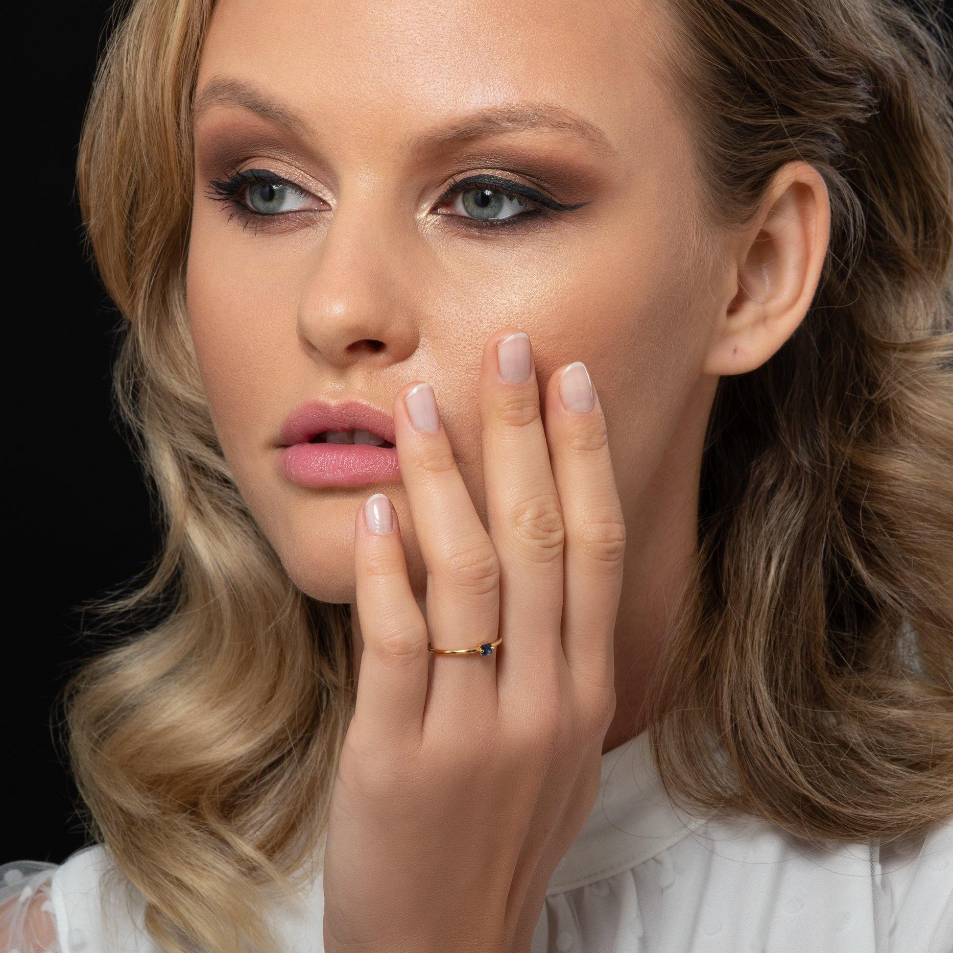 Adjustable Gold Plated Ring for Women with a Blue Cubic Zirconia Stone - namana.london