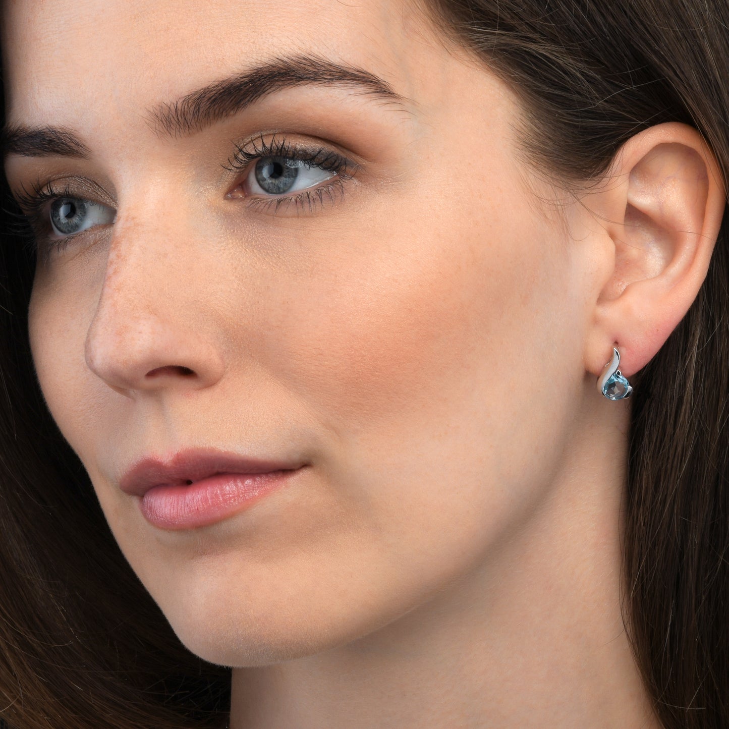 Sterling Silver Stud Earrings With Pear-Shaped Blue Topaz Gemstones
