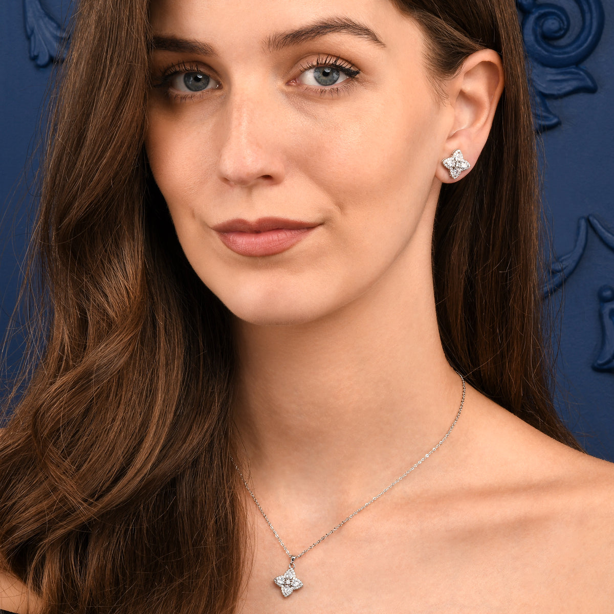 Silver Quatrefoil Stud Earrings With Pear Shaped Cubic Zirconia For Women