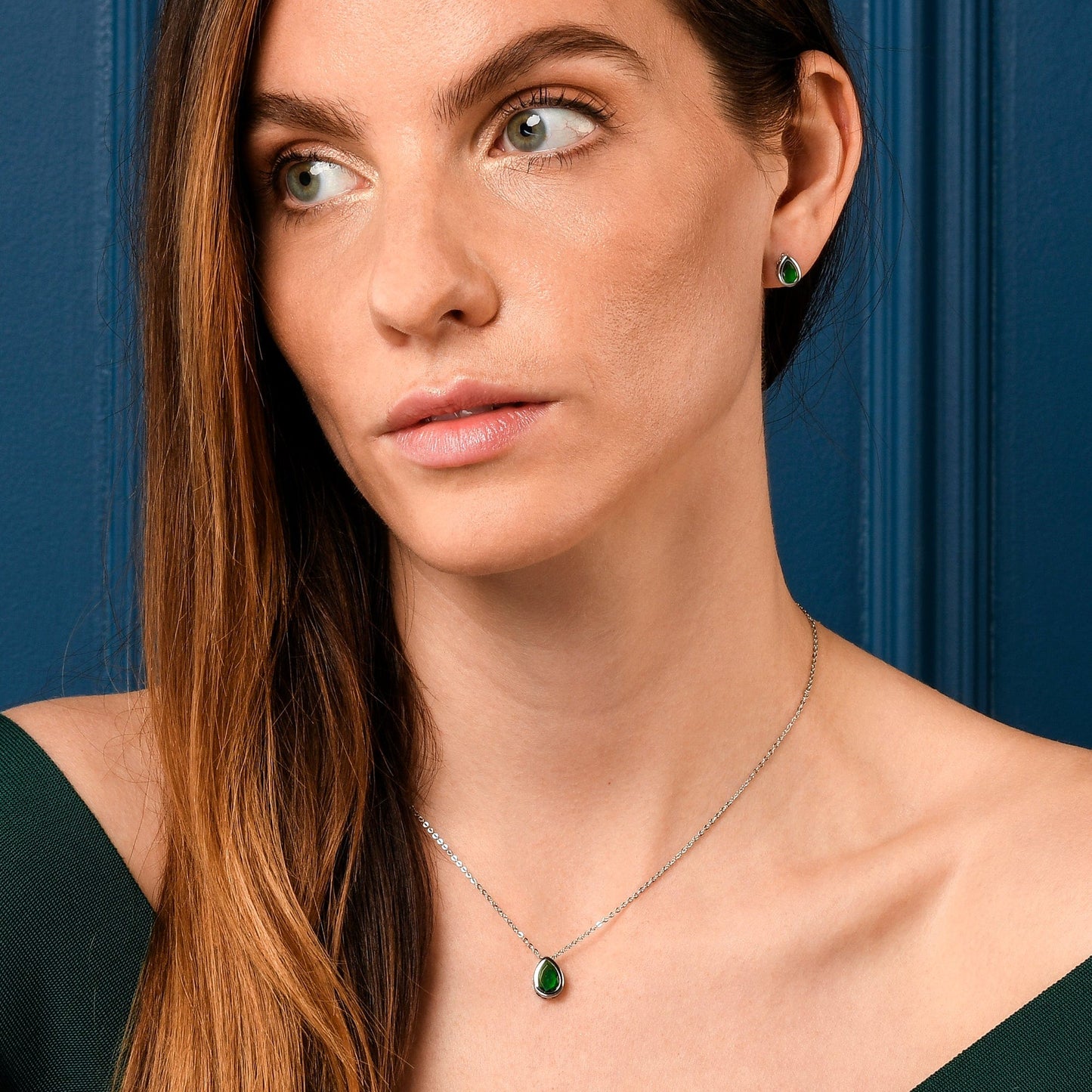 Silver Green Bezel Set Stud Earrings with Pear-Shaped Green Cubic Zirconia Stones