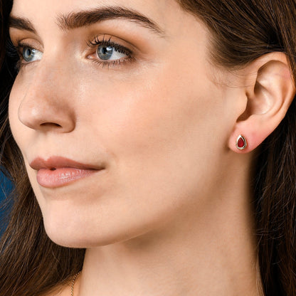 Gold Plated Red Bezel Set Stud Earrings with Pear-Shaped Red Cubic Zirconia Stones