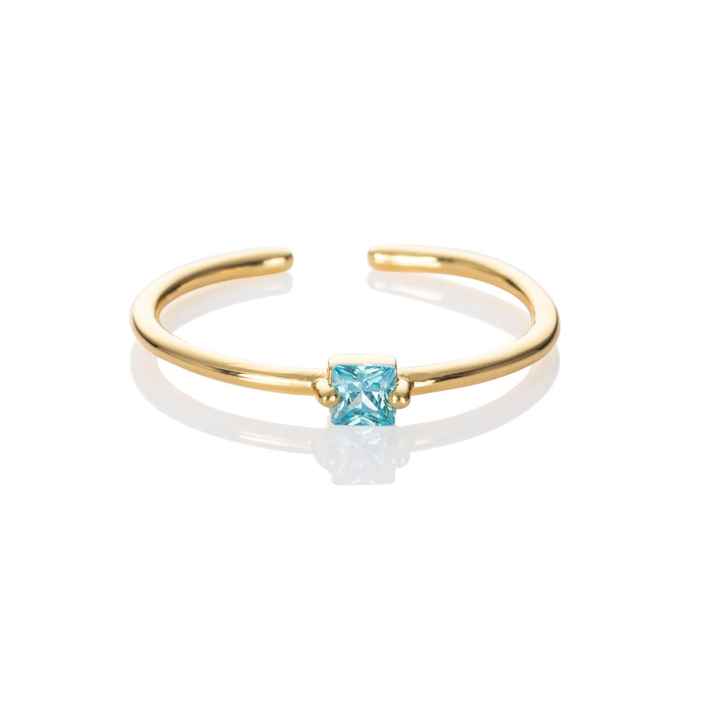 Adjustable Gold Plated Ring for Women with a Light Blue Cubic Zirconia Stone - namana.london