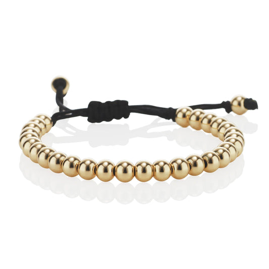 Gold Bracelet for Kids with Metal Beads on Adjustable Black Cord - namana.london