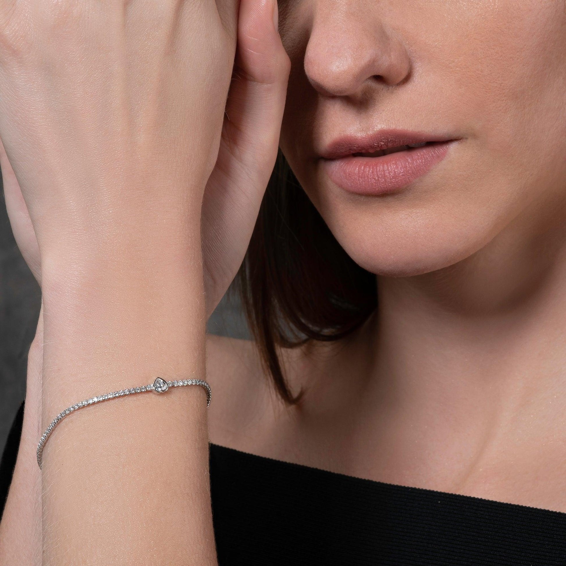 925 Sterling Silver Skinny Tennis Bracelet with a Heart Shaped Stone - namana.london