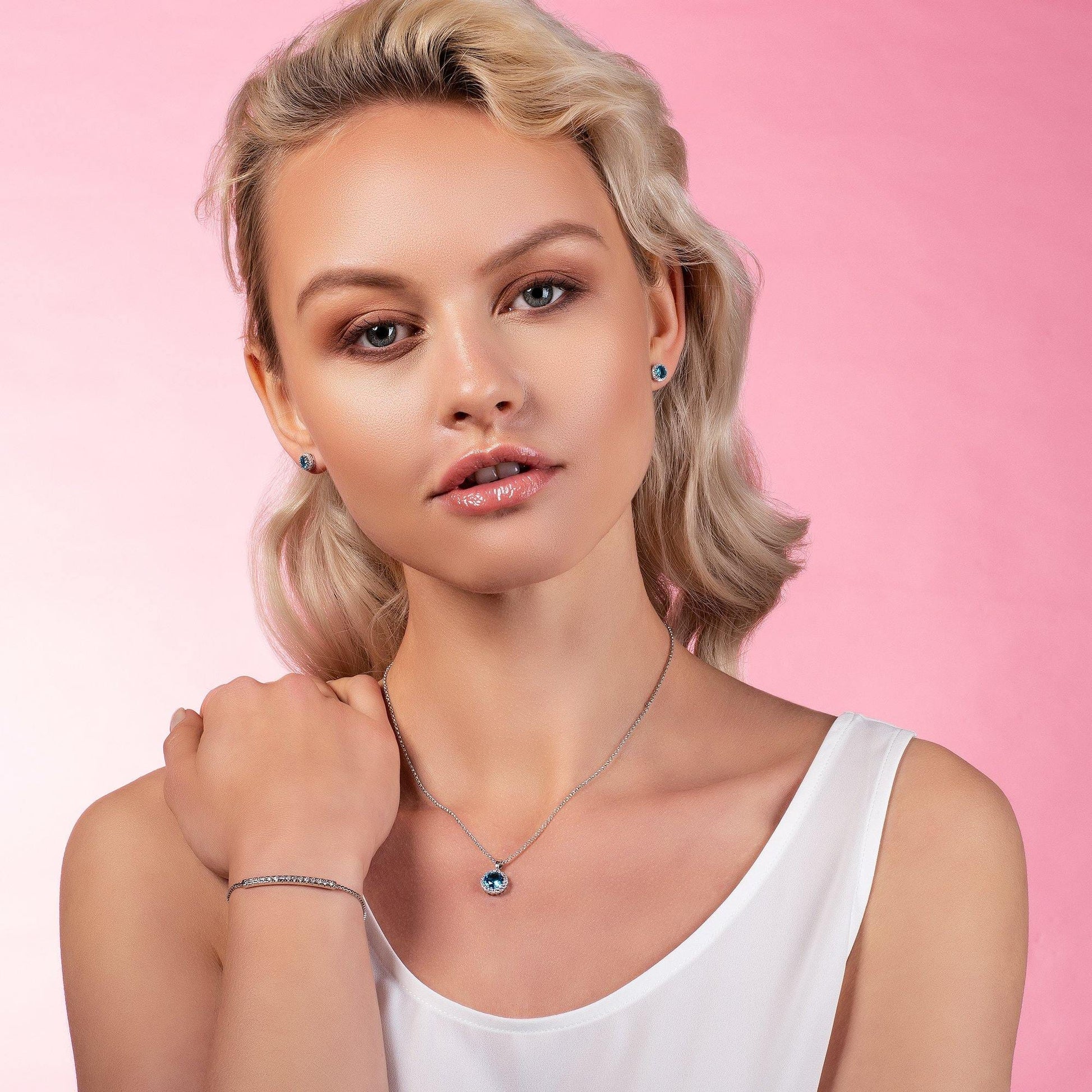 Halo Stud Earrings with Sky Blue Cubic Zirconia Stones - namana.london
