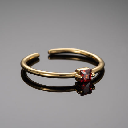 Adjustable Gold Plated Ring for Women with a Red Cubic Zirconia Stone - namana.london