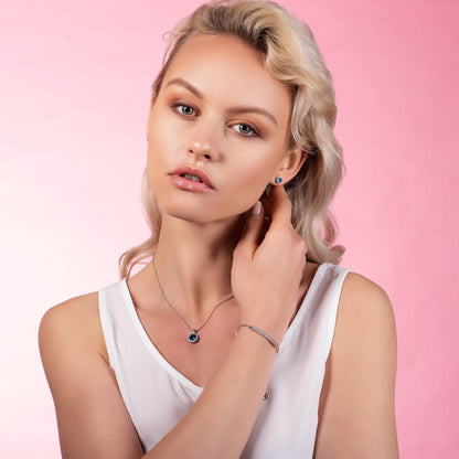 Halo Stud Earrings with Sky Blue Cubic Zirconia Stones - namana.london