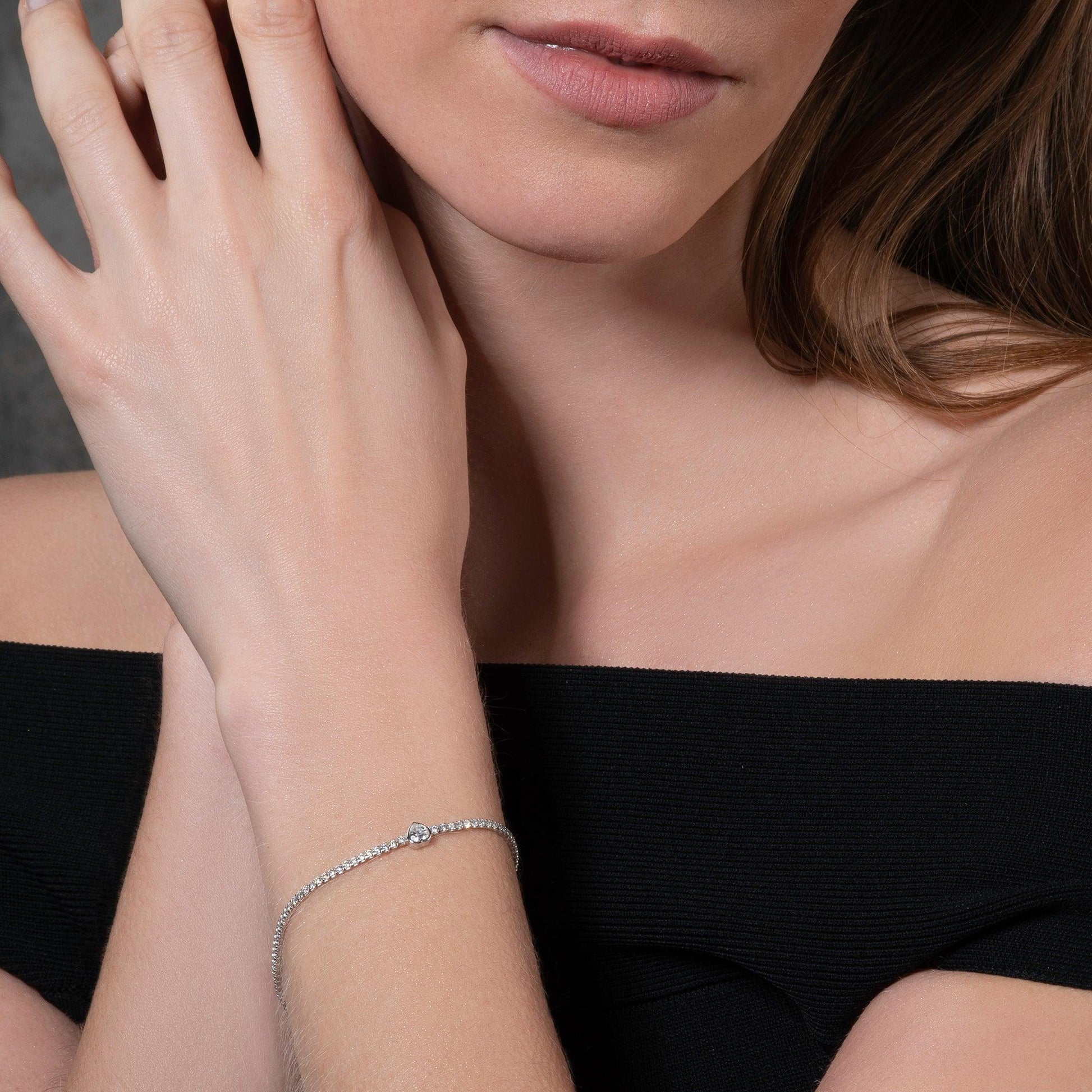 925 Sterling Silver Skinny Tennis Bracelet with a Heart Shaped Stone - namana.london