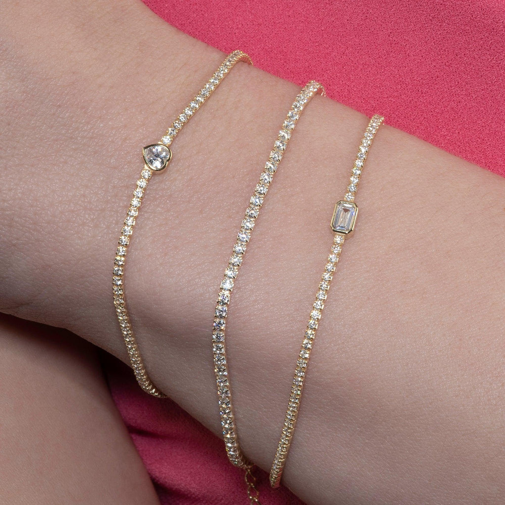 Gold Plated Skinny Tennis Bracelet with a Baguette Stone