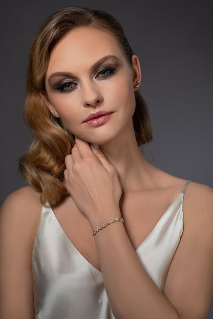 Adjustable Rose Gold Bracelet with Pear Shaped Cubic Zirconia - namana.london