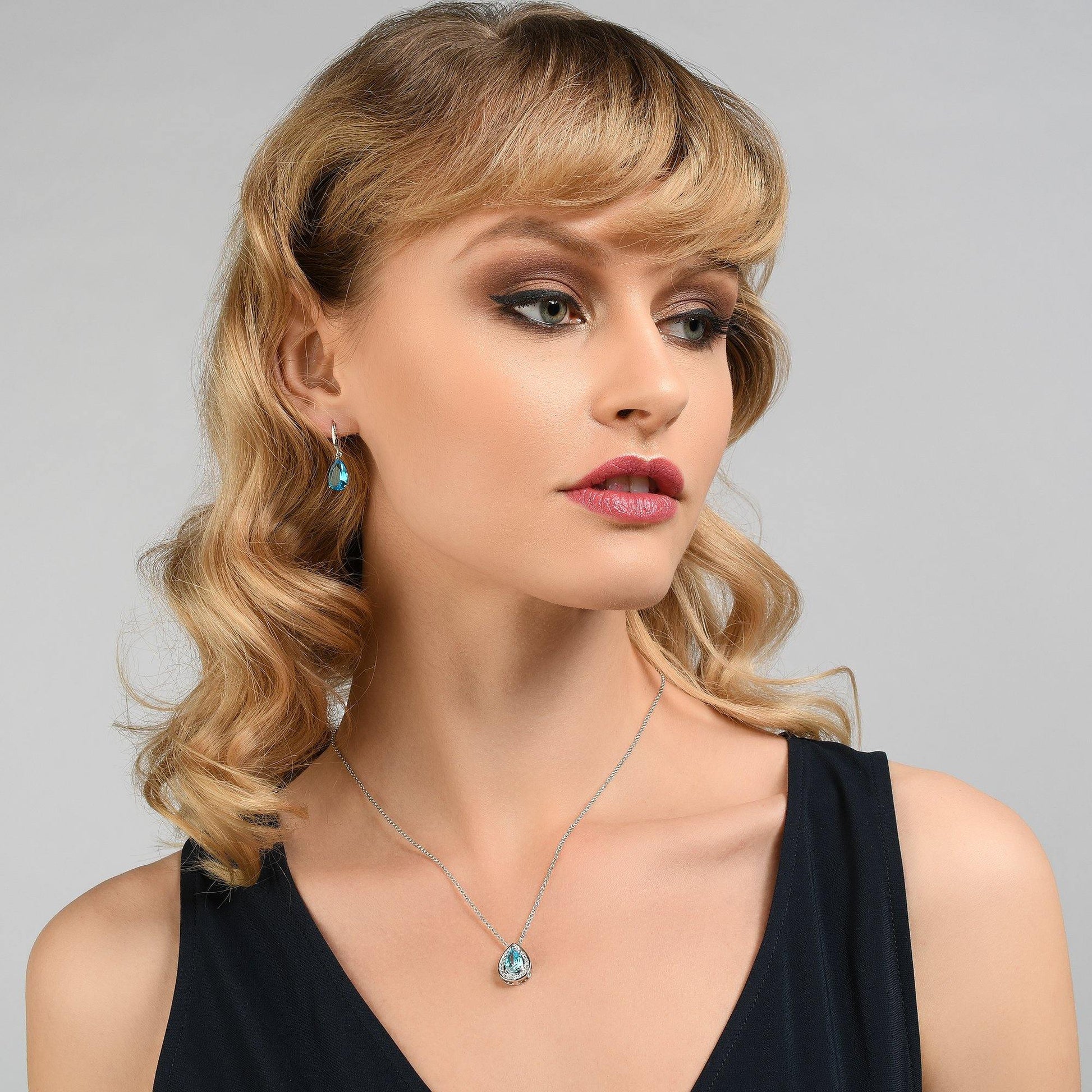 Pear Drop Earrings with Sky Blue Cubic Zirconia Stones - namana.london